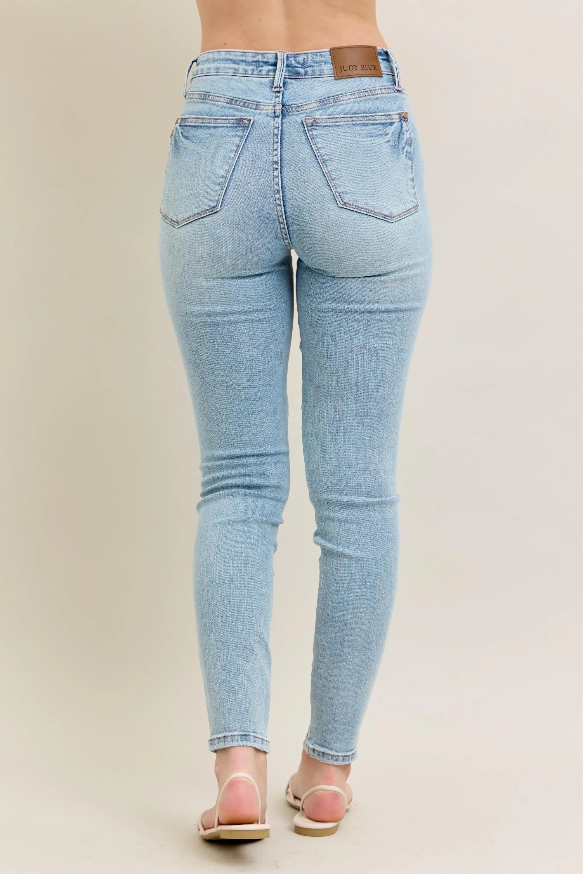Mid Rise Tummy Control Vintage Wash Skinny Jeans