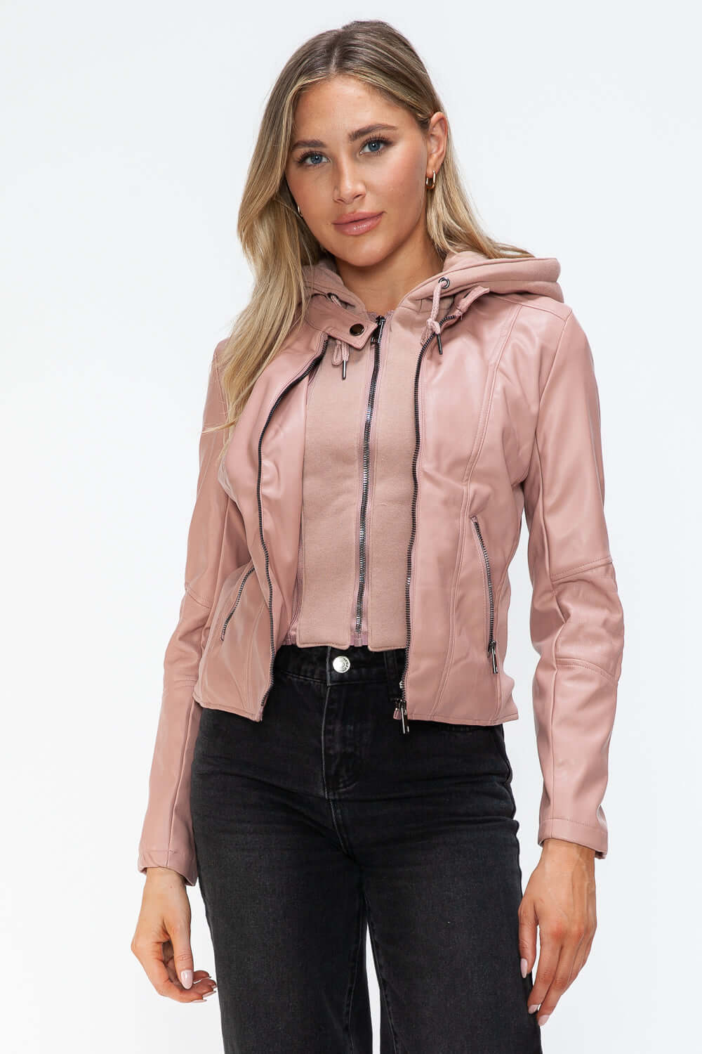 Upgrade your wardrobe with our Faux Leather Zip Up Hooded Jacket. Features a front zipper closure, long sleeves, and an adjustable drawstring hood for a casual and classy touch. Stay stylish and protect yourself from the elements with this must-have jacke