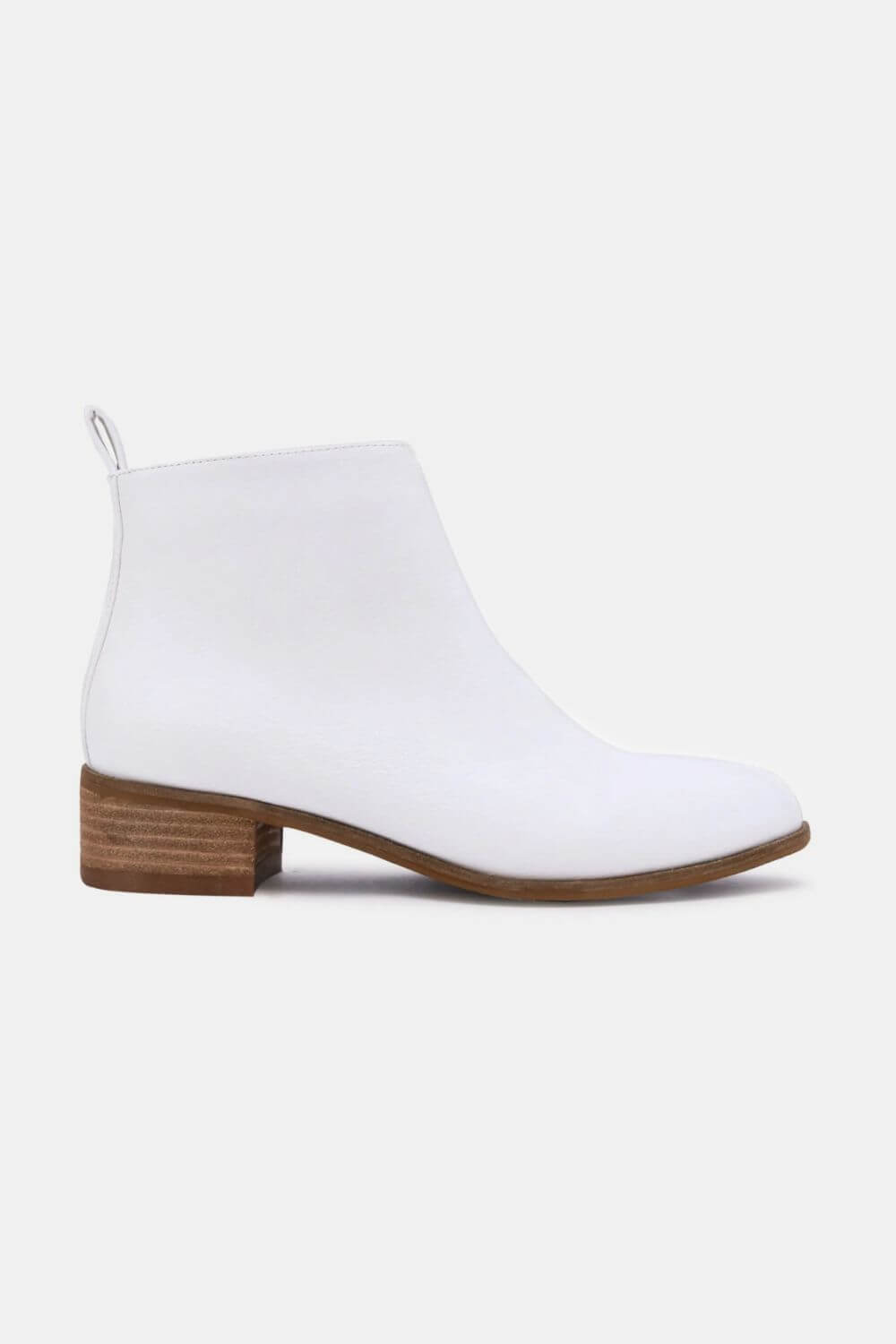 White PU leather block heel boots with a low heel and wooden sole, perfect for versatile and comfortable all-day wear.