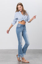 Mid Rise Frayed Flare Crop Jeans