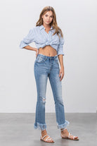 Mid Rise Frayed Flare Crop Jeans