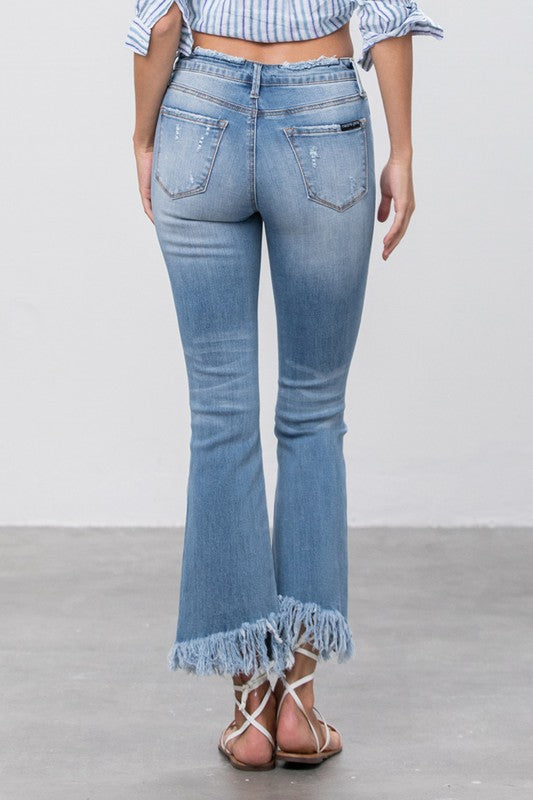Mid Rise Frayed Flare Crop Jeans