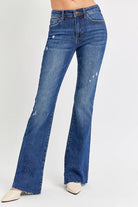 Distressed Mid Rise Flare Jeans