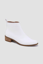 White PU leather block heel ankle boots with wooden heel, ideal for stylish and comfortable all-day wear.