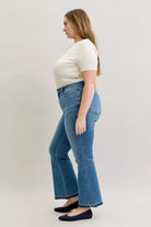 Mid Rise Slim Bootcut Tummy Control Release Hem Jeans