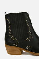 Black studded detail point toe ankle boots with a chic stacked heel and western-inspired design.