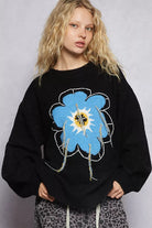 Floral Sweater with Exposed Stitching