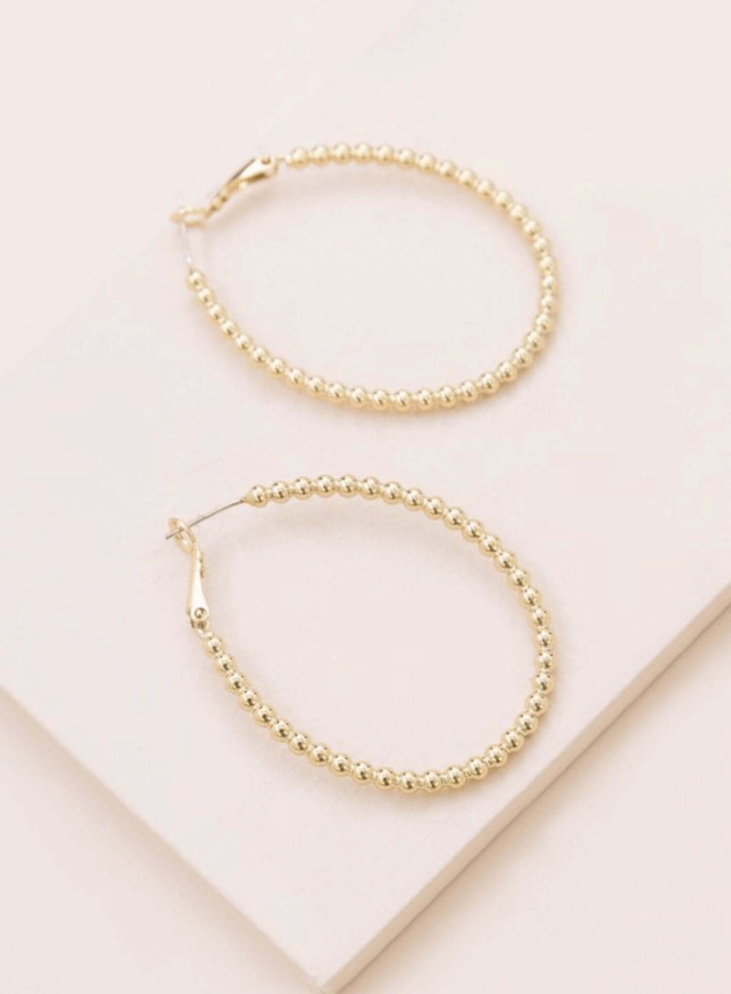 Beaded Oval Hoop Earrings - Rocca & Co